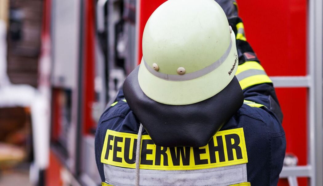 Ein Feuerwehrmann bei einer Übung Ein Feuerwehrmann bei einer Übung