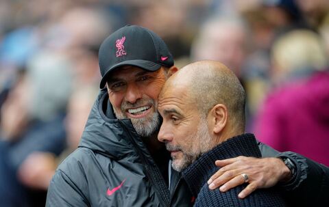 Jürgen Klopp (l) und Pep Guardiola